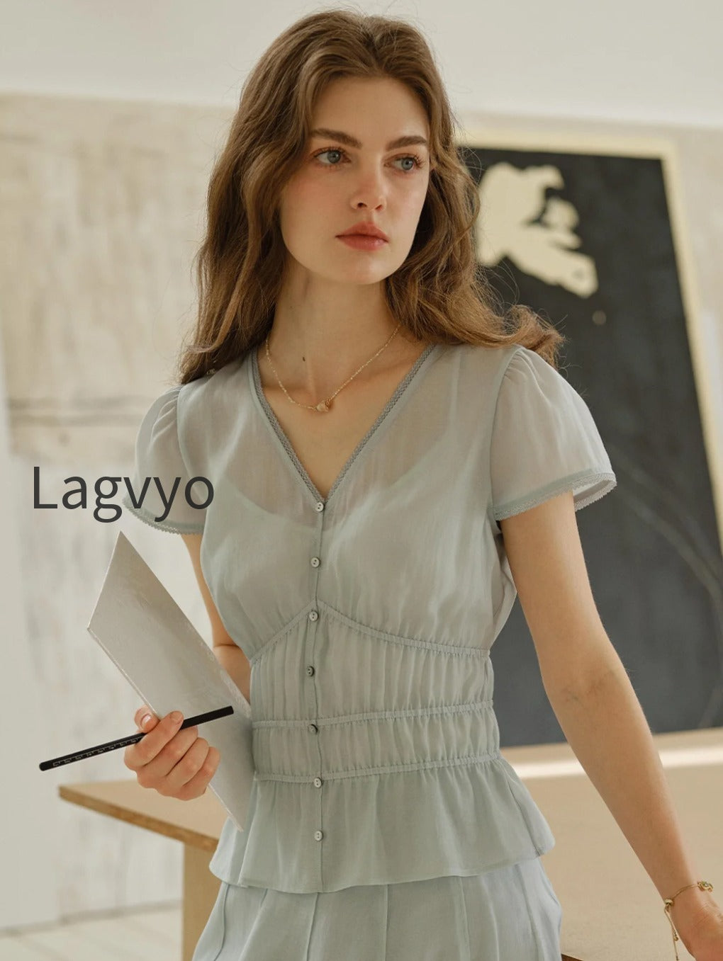 bella-v-neck-smocking-blouse
