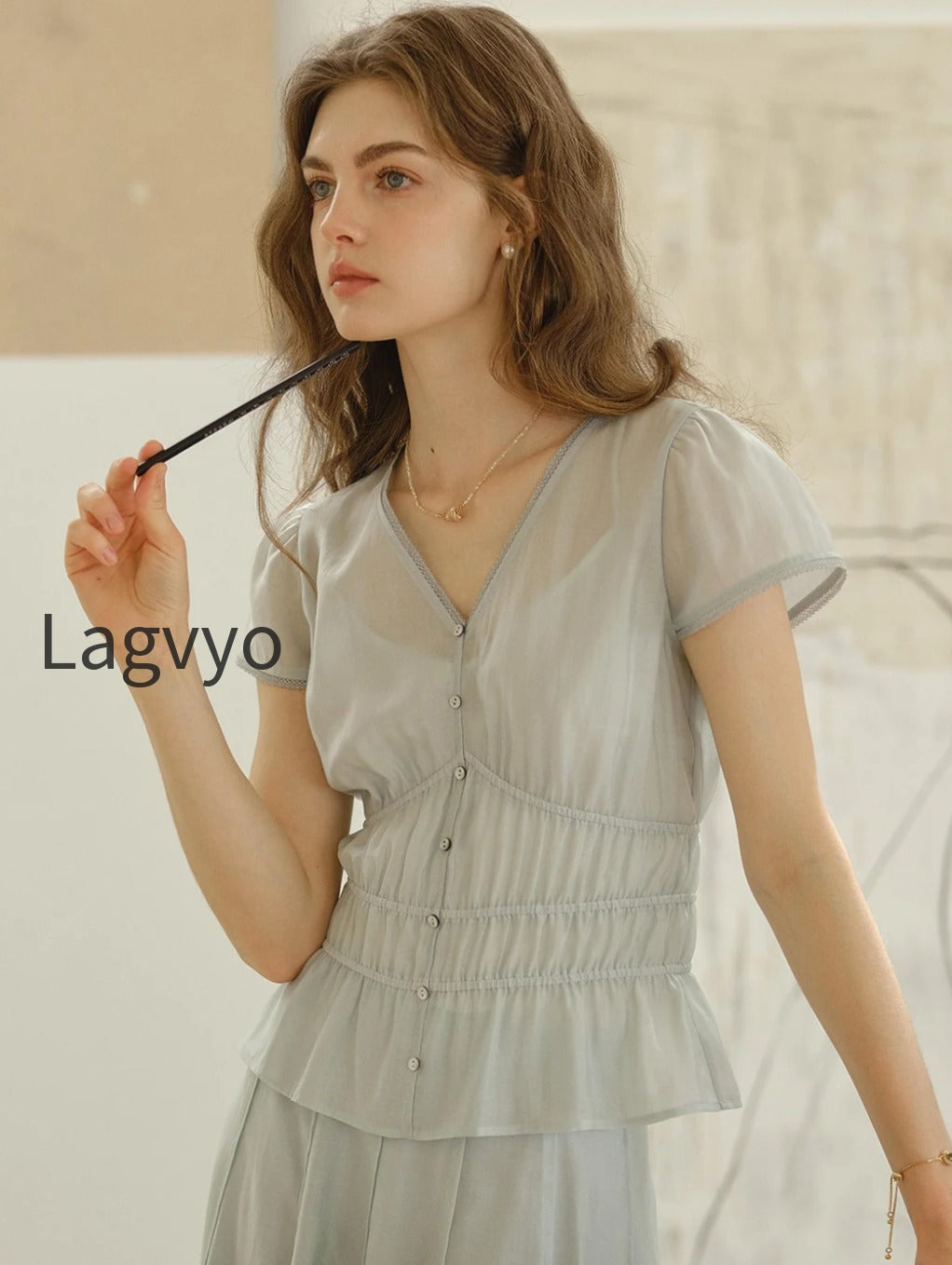 bella-v-neck-smocking-blouse